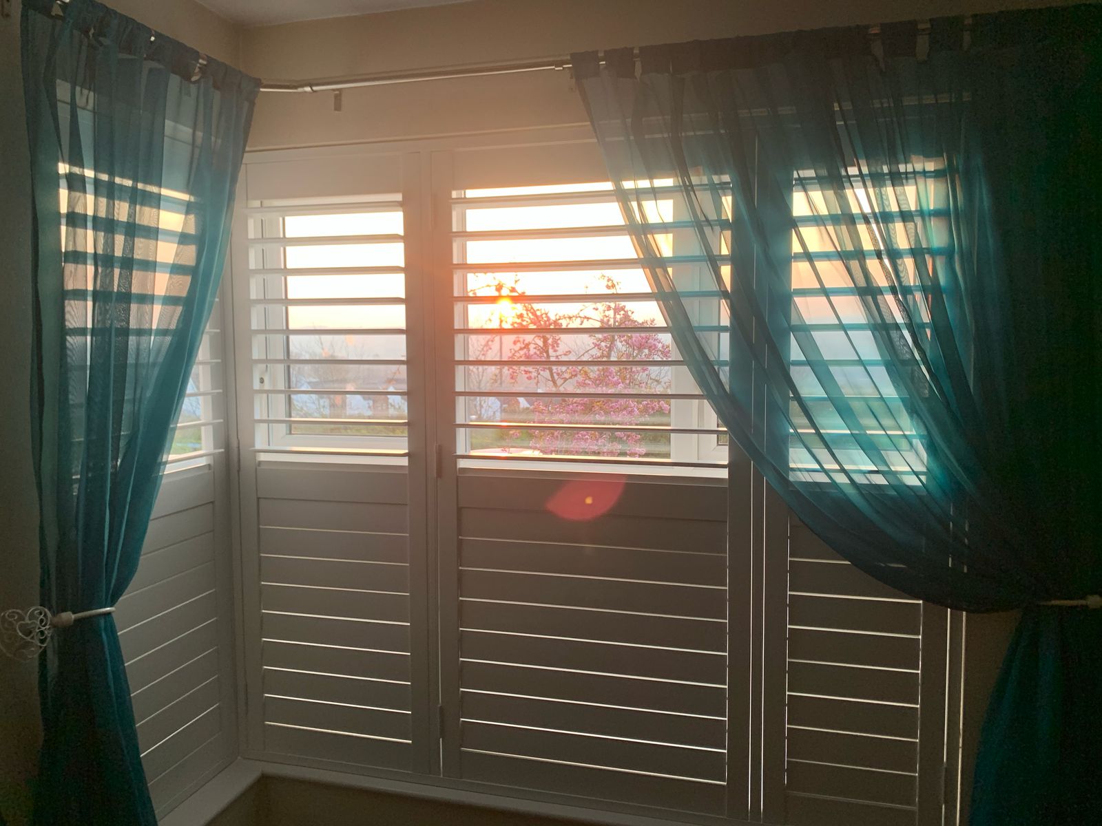 half opened closed shutters front