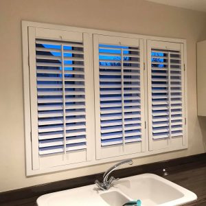 shutters white in bathroom