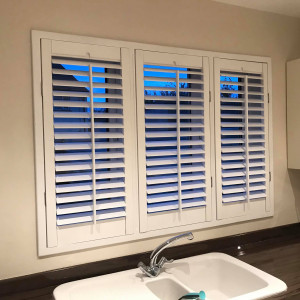 shutters white in bathroom