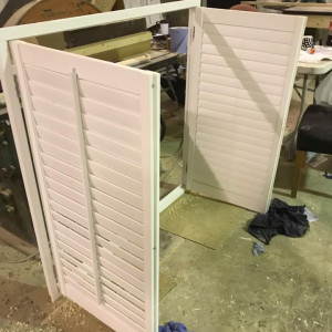shutters white built and opened