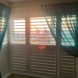 half opened closed shutters front