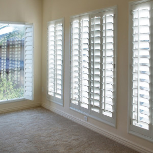 shutters in room sunlight coming through