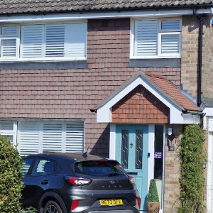 house front with shutters placed in