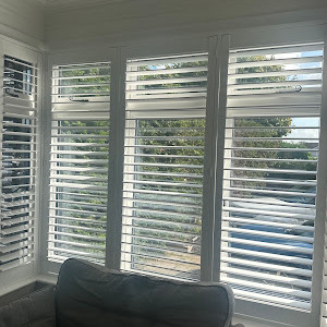 living room window sofa shutters