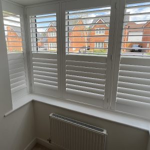 living room white shutters