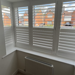 living room white shutters